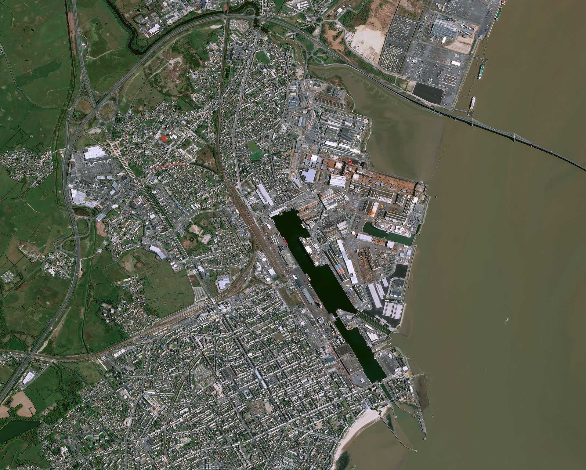 Port of Saint Nazaire as seen by the Pleiades satellite. Because of certain sensitive activities, particularly energy-related, port areas are subject to special surveillance by INERIS.